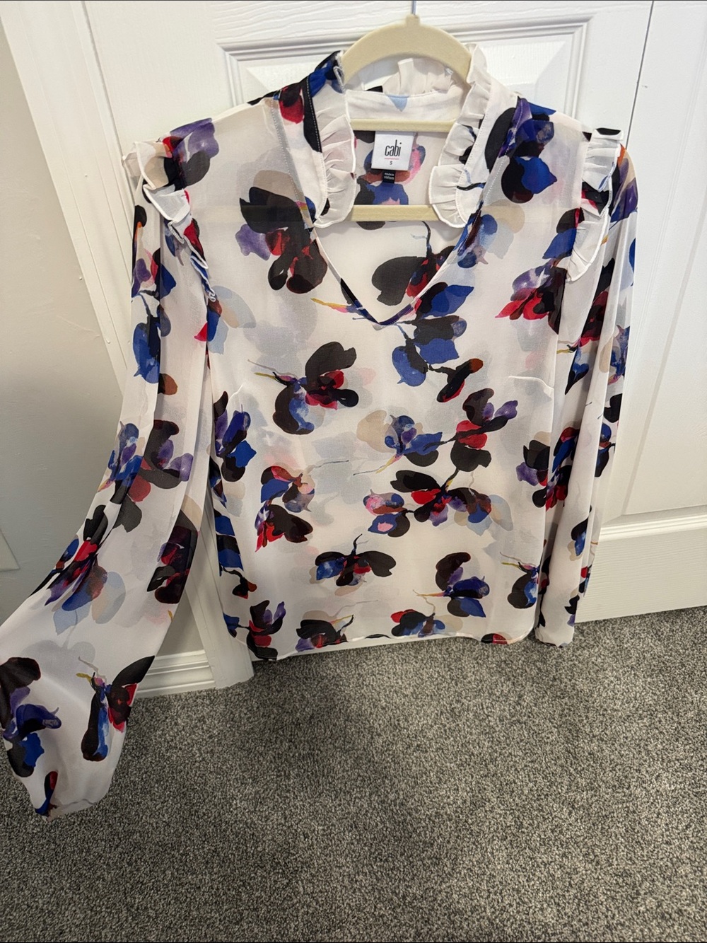 CAbi White Floral V-Neck Ruffle Blouse with Blue and Black Accents